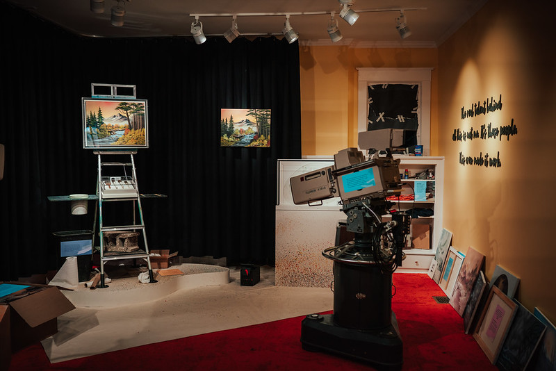 studio view of a tv camera and set from the Bob Ross show on PBS