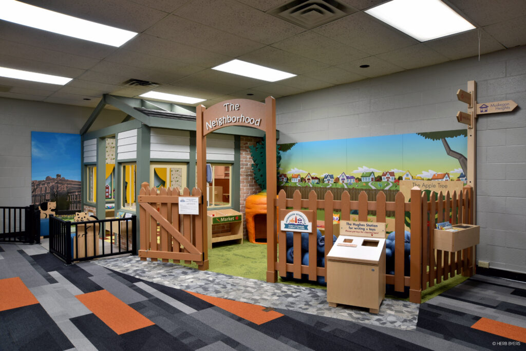 Custom-designed and fabricated neighborhood-themed play space