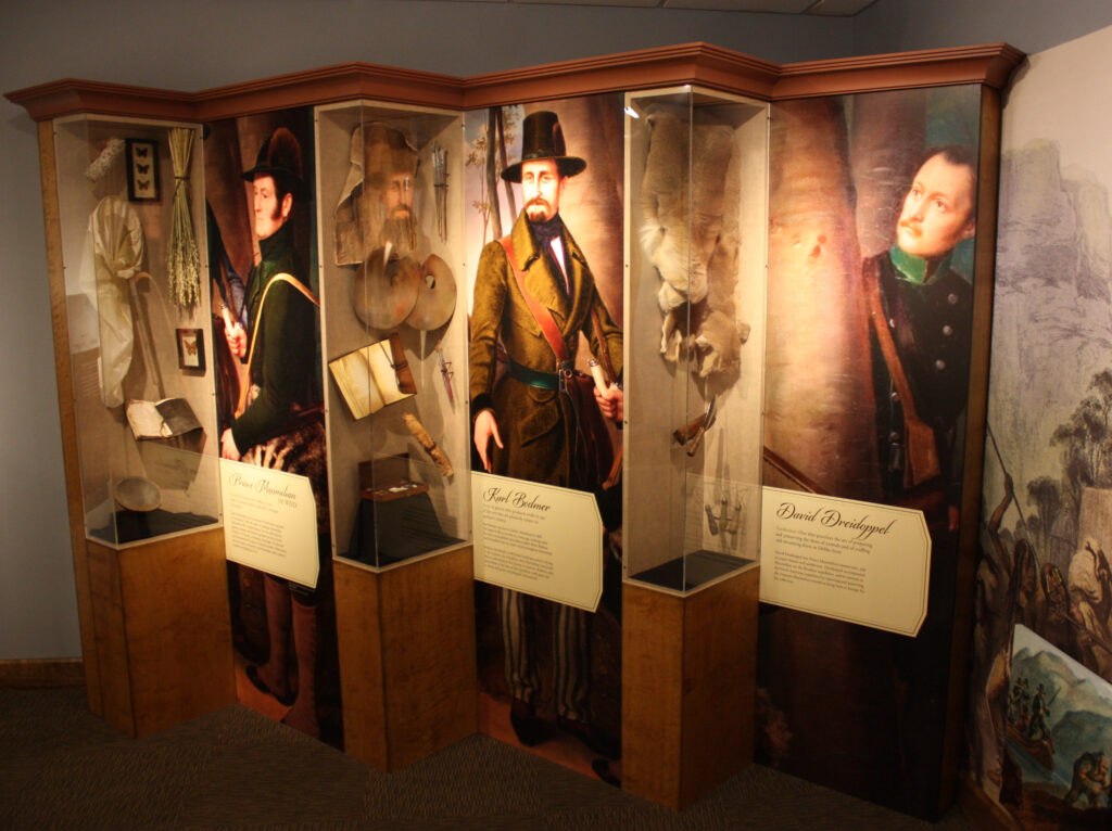 Custom-made exhibit cases and signage showcasing historic artifacts
